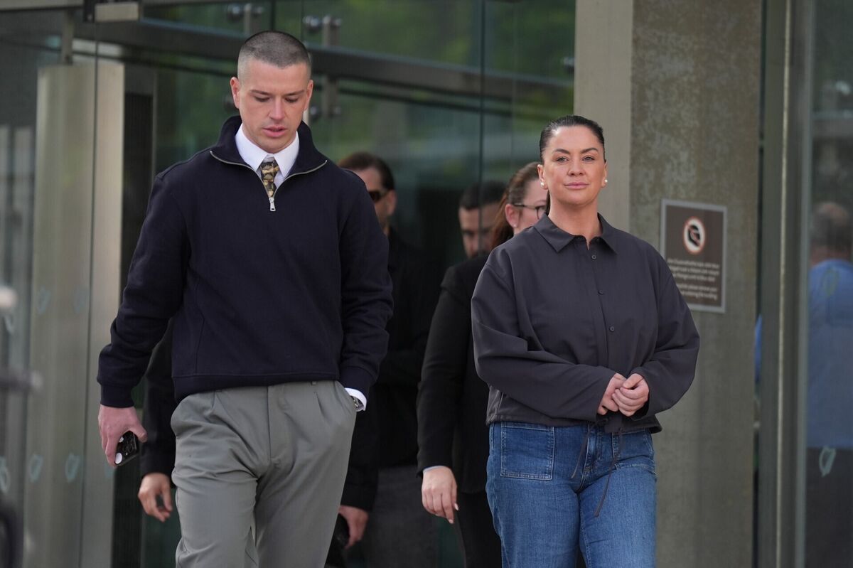 Daughter and son of Noel Kirwan outside the Criminal Courts Of Justice in Dublin on Monday. Photo: Niall Carson/PA