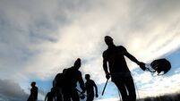 Tipperary players collects their helmets after the game 12/1/2014