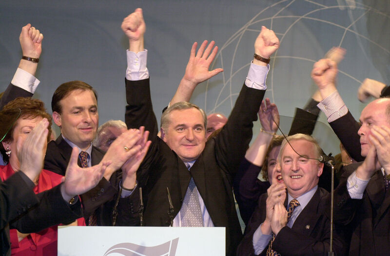 Bertie Ahern cheered by his front bench at his party's ard fheis in 2000. With him are Mary O Rourke, Dick Roche, Micheal Martin. Photo: RollingNews.ie Bertie Ahern cheered by his front bench at his party's ard fheis in 2000. With him are Mary O Rourke, Dick Roche, Micheal Martin. Photo: RollingNews.ie