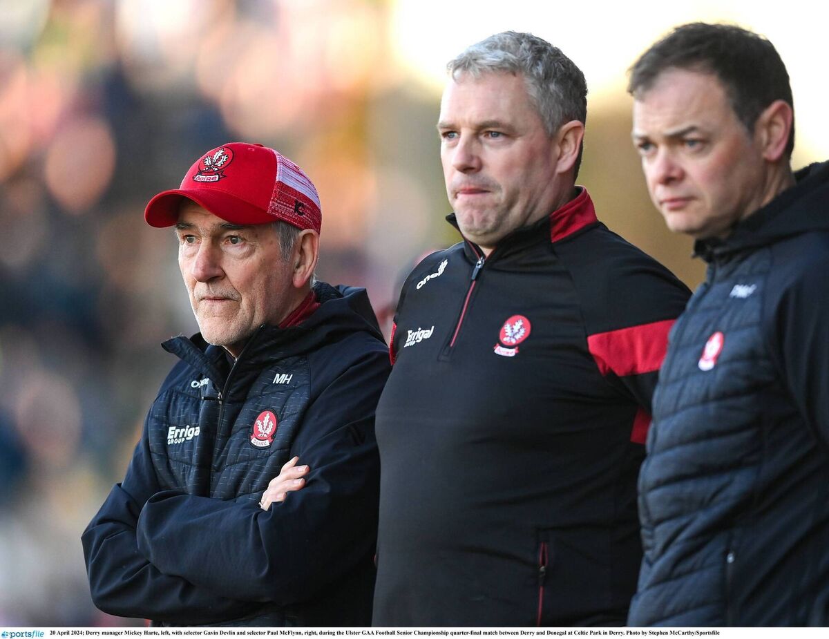 Derry manager Mickey Harte, left, with selector Gavin Devlin and selector Paul McFlynn, right, during the 2024 Ulster SFC quarter-final defeat to Donegal. Pic: Stephen McCarthy/Sportsfile Derry manager Mickey Harte, left, with selector Gavin Devlin and selector Paul McFlynn, right, during the 2024 Ulster SFC quarter-final defeat to Donegal. Pic: Stephen McCarthy/Sportsfile
