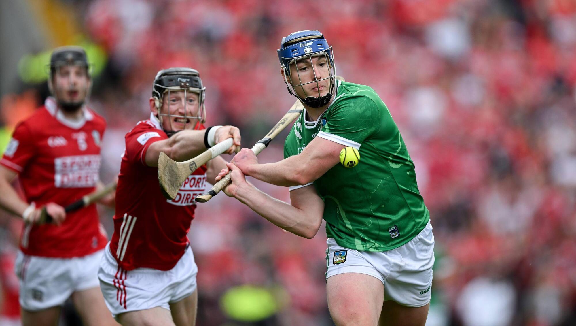 Shane O'Brien of Limerick is tackled by Damien Cahalane of Cork during the Munster SHC clash at SuperValu Páirc Uí Chaoimh in Cork. Photo by Ray McManus/Sportsfile