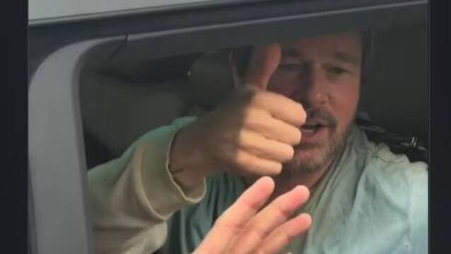 <p>A screenshot of Brad Pitt waving to fans in Cork. Picture: Emma Twomey/Instagram</p>