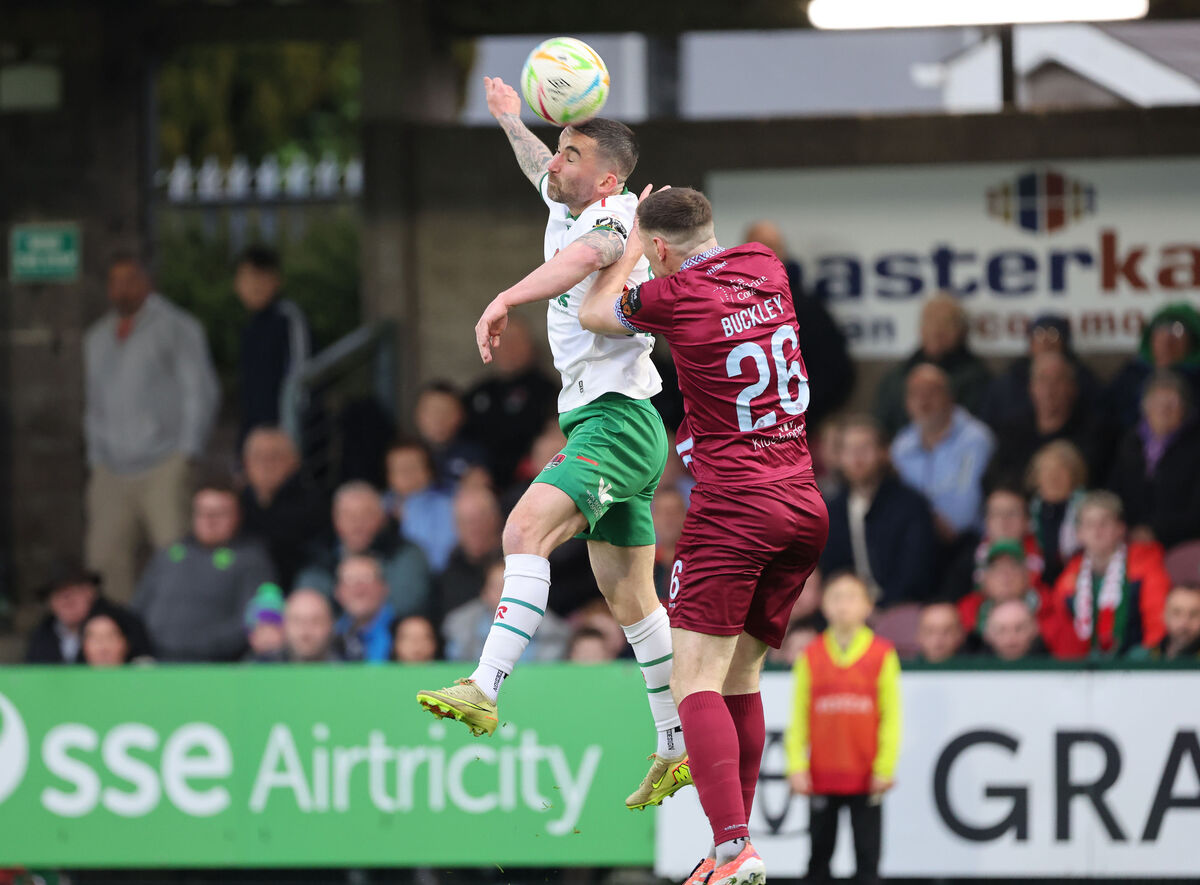  Sean Maguire of Cork City battles Gary Buckley, Cobh. Pic: Jim Coughlan.
