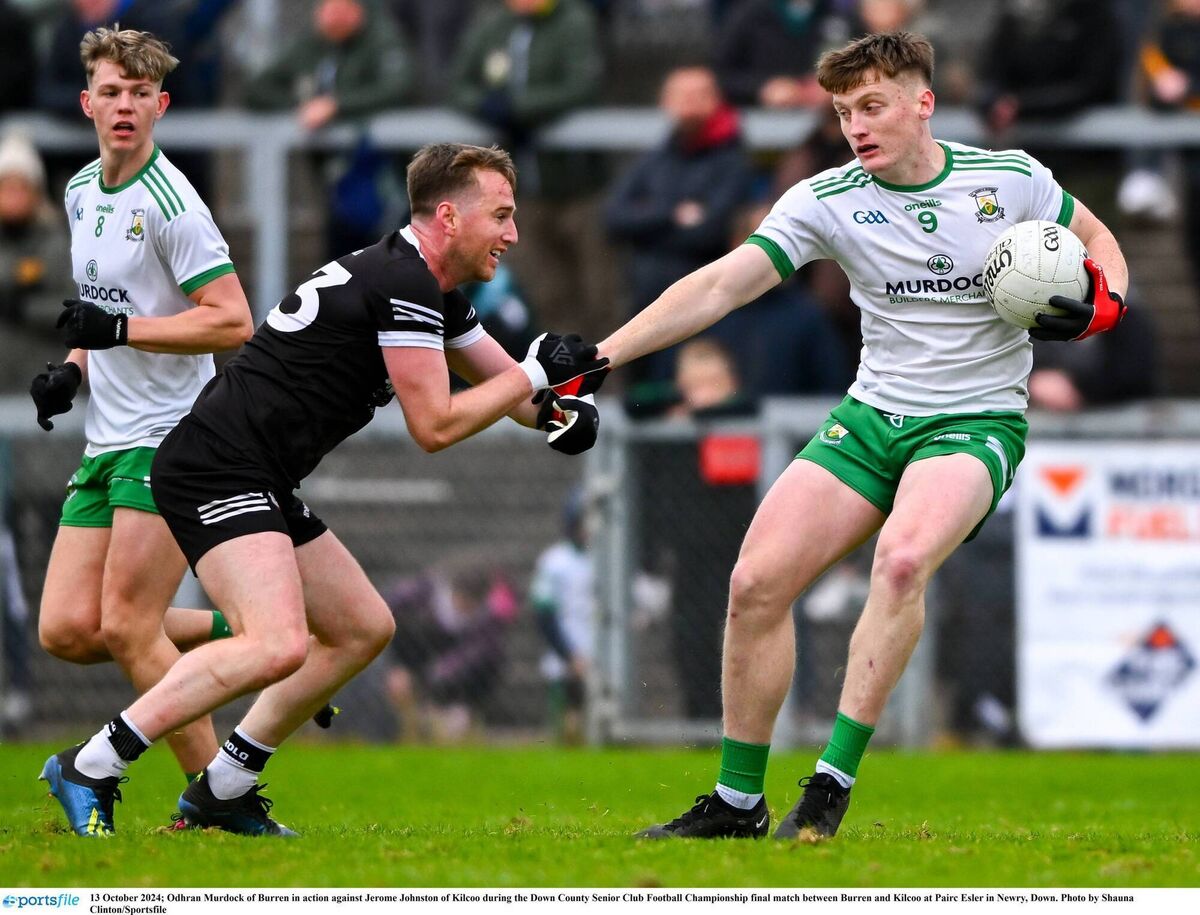 Odhrán Murdock of Burren in action against Jerome Johnston of Kilcoo during the 2024 Down SFC final. Pic: Shauna Clinton/Sportsfile Odhrán Murdock of Burren in action against Jerome Johnston of Kilcoo during the 2024 Down SFC final. Pic: Shauna Clinton/Sportsfile
