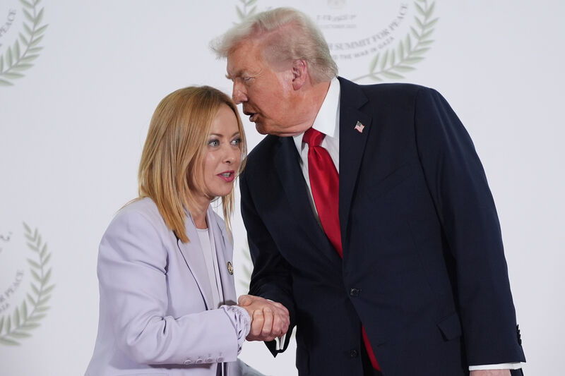 President Donald Trump greets Italy's Prime Minister Giorgia Meloni during summit to support ending the more than two-year Israel-Hamas war in Gaza. (AP Photo/Evan Vucci, Pool, File)