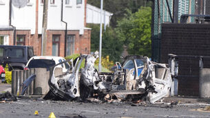<p>The scene in Dunmurry in Northern Ireland after reports of a car explosion outside a police station.  File picture</p>
