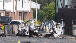 <p>The scene in Dunmurry in Northern Ireland after reports of a car explosion outside a police station.  File picture</p>