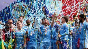 <p>BLUE SKIES: Coventry City's captain Matt Grimes and his team mates lift the Sky Bet Championship trophy during the trophy presentation following the Sky Bet Championship match at the Coventry Building Society Arena, Coventry. Pic: Jacob King/PA Wire</p>