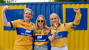 <p>TRUE COLOURS: Clare supporters, from left, Claire McDonnell, Lorna Crowe and Louise McDonnell, from Ruan, before the game against Limerick on Sunday. Pic: Tom Beary/Sportsfile</p>