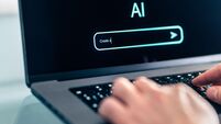 AI prompt chat bot. Search website to generate data, text or image. Man using computer with artificial intelligence app. Virtual