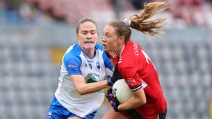 <p>DEISE DELIGHT: Cork's Rachel Leahy in action against Waterford's Emma Murray. Pic: Jim Coughlan.</p>