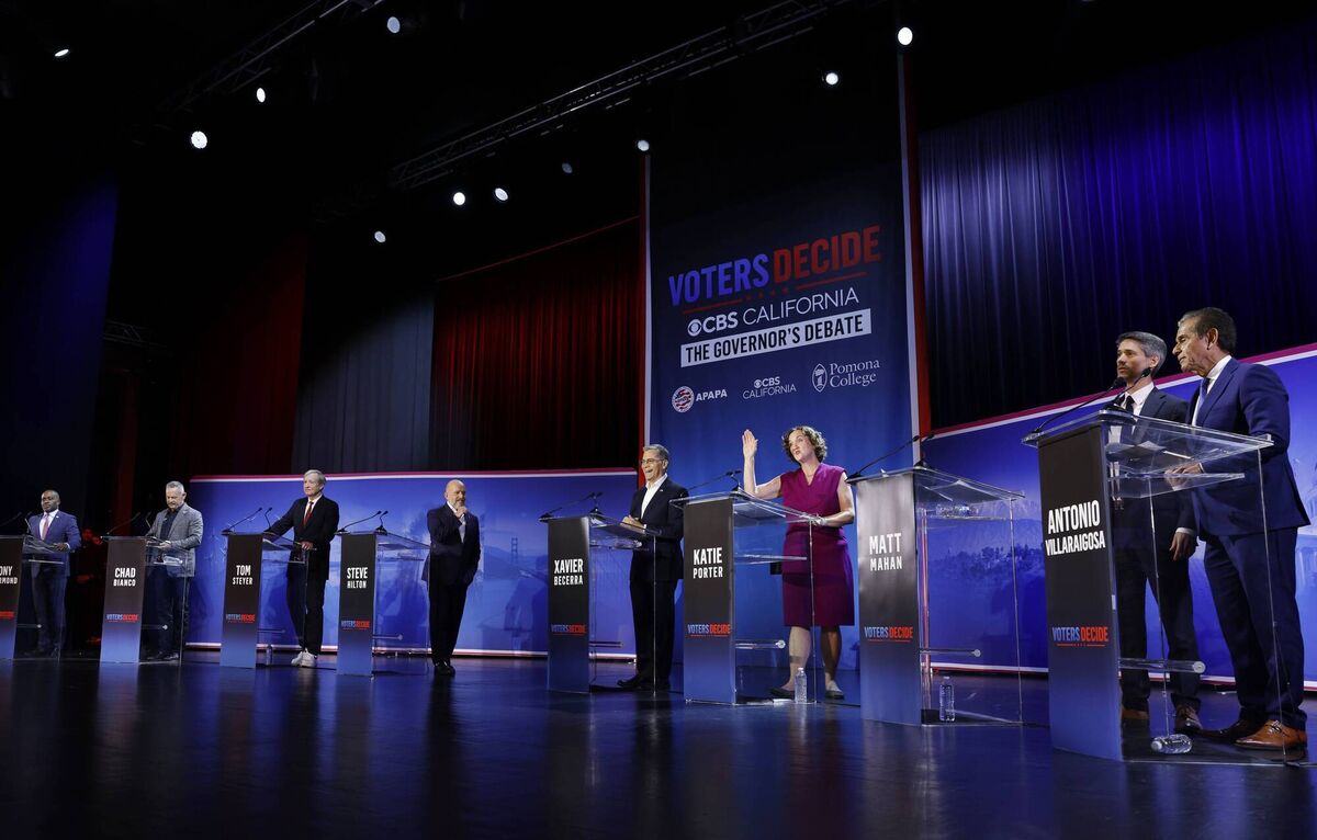 California gubernatorial candidates (L-R) Democrat Tony Thurmond, Republican Chad Bianco, Democrat Tom Steyer, Republican Steve Hilton, Democrat Xavier Becerra, Democrat Katie Porter, Democrat Matt Mahan and Democrat Antonio Villaraigosa stand during a commercial break during the CBS California Gubernatorial Debate at Pomona College on April 28. Picture: Mario Tama/Getty