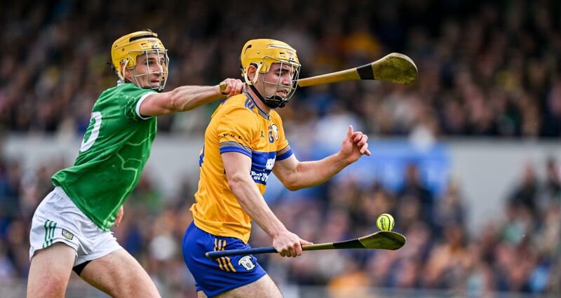 CARRYING THE FIGHT: Mark Rodgers of Clare is tackled by Cathal O'Neill. Photo by Ray McManus/Sportsfile CARRYING THE FIGHT: Mark Rodgers of Clare is tackled by Cathal O'Neill. Photo by Ray McManus/Sportsfile
