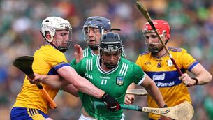 <p class="contextmenu internal_Caption">Clare’s Adam Hogan tackles Aidan O’Connor of Limerick Mandatory Credit ©INPHO/James Crombie</p>