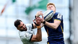 <p>RC Toulon's Charles Ollivon competes in the air with Leinster's Tommy O'Brien. Pic: ©INPHO/Ben Brady</p>
