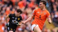 Darragh McMullen celebrates after Tomas McCormack scores their side's first goal 3/5/2026