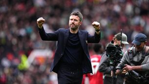 <p>Michael Carrick celebrates the win over Liverpool. Pic: Martin Rickett/PA</p>