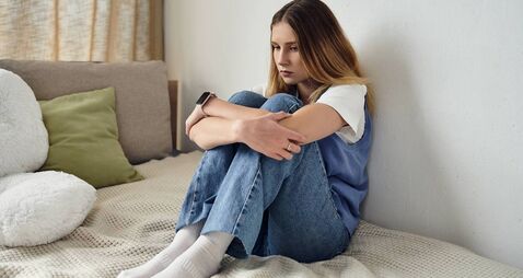Reflective moments of a modern teenager in her cozy apartment during evening hours