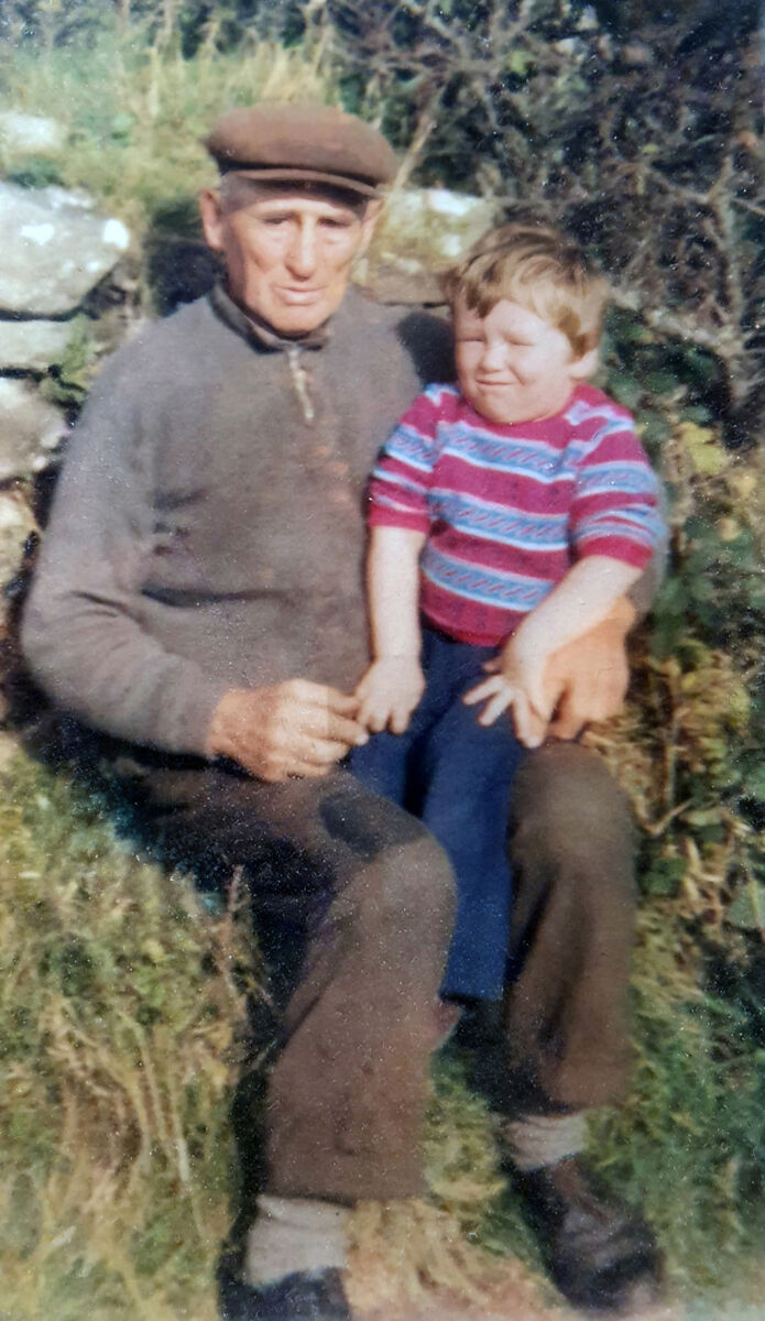Dáithí Ó Sé as a three-year-old on his granddad’s knee.