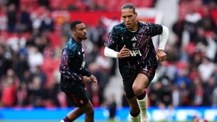 <p>Liverpool's Virgil van Dijk warming up ahead of the Premier League match at Old Trafford. Pic: Martin Rickett/PA Wire.</p>