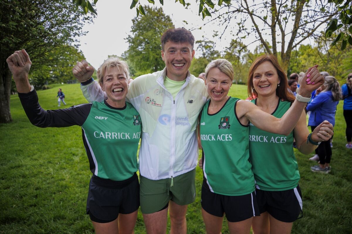 Jordan Adams (second from left) with runners from Carrick Aces Athletic Club, who came out to show their support. Photo: Liam McBurney/PA Jordan Adams (second from left) with runners from Carrick Aces Athletic Club, who came out to show their support. Photo: Liam McBurney/PA