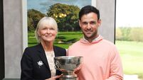 Paul Coughlan is presented with the Munster Men's Stroke Play Championship trophy by Mary Fitzgerald 3/5/2026