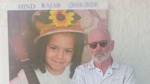 <p>One of the organisers of the gathering, Martin Roper, with a picture of Hind Rajab. Picture: Martin Roper</p>