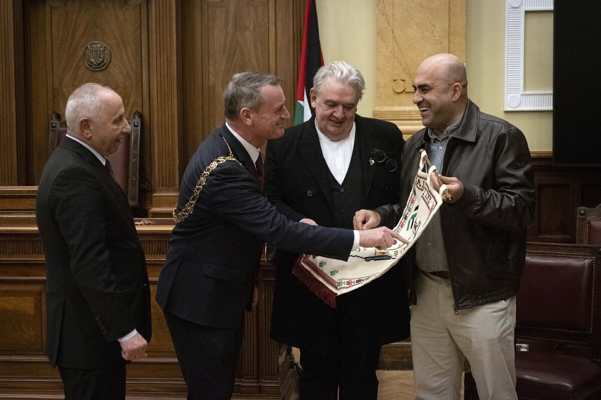 Cork's Lord Mayor Fergal Dennehy, author Cónal Creedon, and Izzeddeen Alkarajeh who runs Izz Cafe Palestinian restaurant on George's Quay, at an event in February to welcome Husam Shakhshir, the mayor of Nablus in Palestine, left. Picture: Clare Keogh Cork's Lord Mayor Fergal Dennehy, author Cónal Creedon, and Izzeddeen Alkarajeh who runs Izz Cafe Palestinian restaurant on George's Quay, at an event in February to welcome Husam Shakhshir, the mayor of Nablus in Palestine, left. Picture: Clare Keogh
