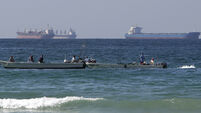 US and Iran launch new attacks as they wrestle for control of Gulf waters