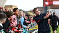 Jack Crowley takes a selfie with a fan after the match 25/4/2026