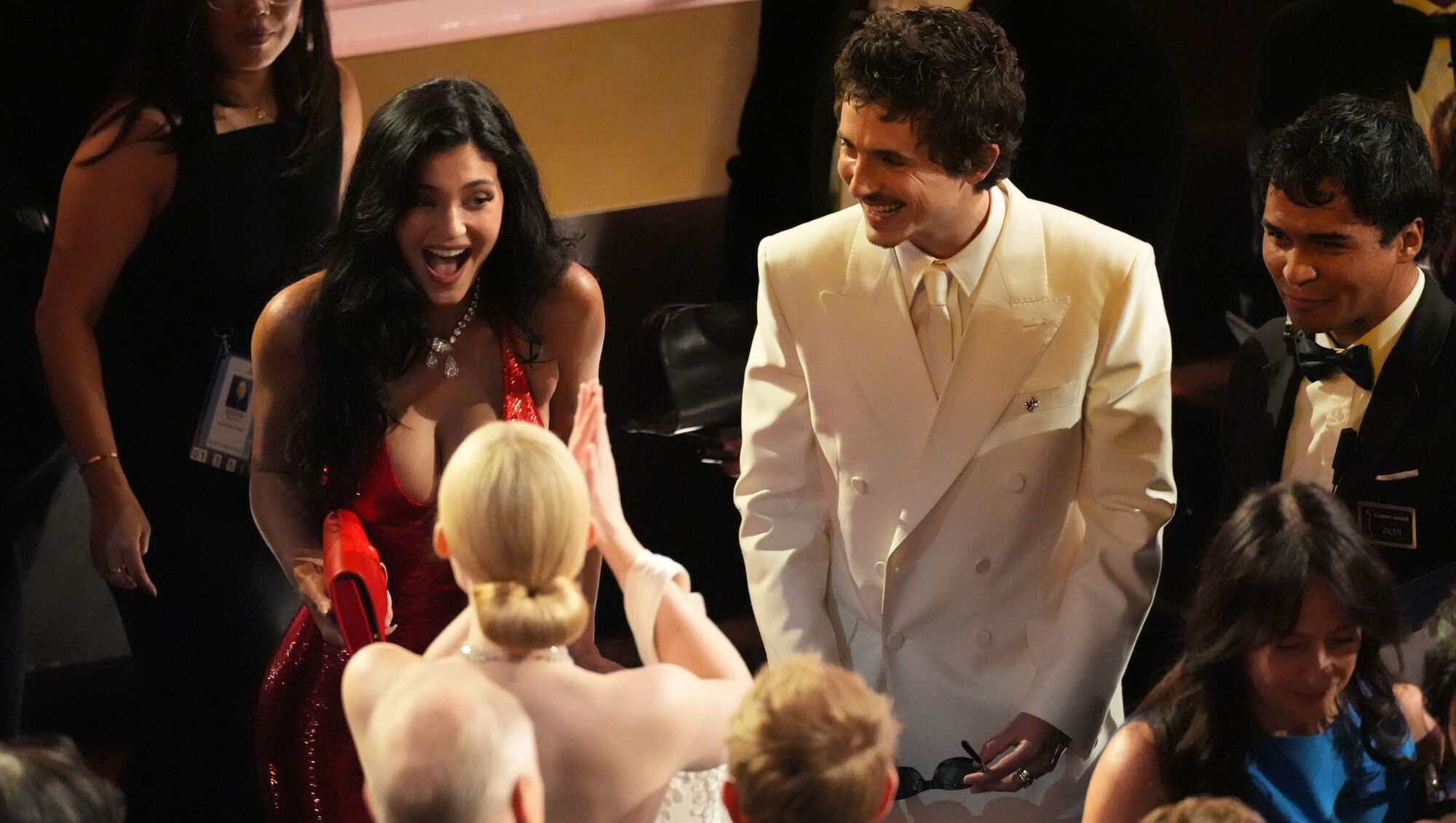 Kylie Jenner (left) and Timothee Chalamet (right) greet Elle Fanning at the Oscars in March. He did not win an award. Whether or not it was because of his comments about opera and ballet one cannot be sure, but it certainly did not help his case. Photo: AP/Chris Pizzello
