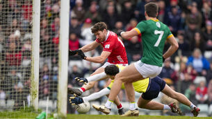 <p>Paul Walsh of Cork has goal attempt saved by Seán Brennan of Meath. Pic: James Lawlor/Inpho</p>
