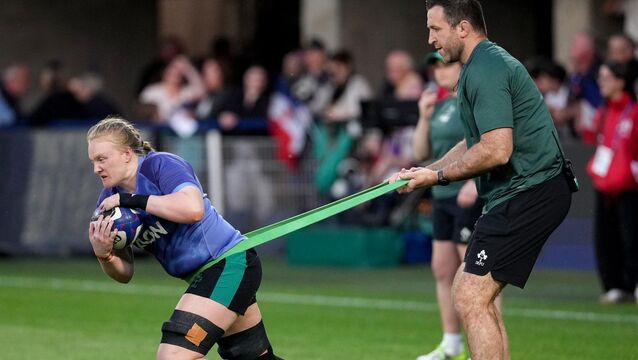<p>Ireland's Aoife Wafer and Alan O’Connor during the warm up before Ireland's meeting with France. Pic: ©INPHO/Dave Winter</p>