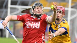 <p> BATTLE: Cork's Finn O'Brien and Clare's Joe Casey tussle for possession. Pic: Eddie O'Hare.</p>