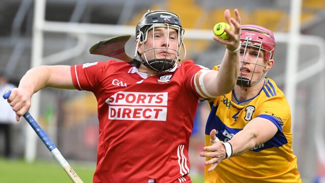 <p> BATTLE: Cork's Finn O'Brien and Clare's Joe Casey tussle for possession. Pic: Eddie O'Hare.</p>