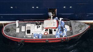 <p>Health personnel assisting patients onto a boat from the cruise ship MV Hondius, while stationary off the port of Praia, the capital of Cape Verde, on May 6, 2026. Picture:  AFP via Getty Images</p>