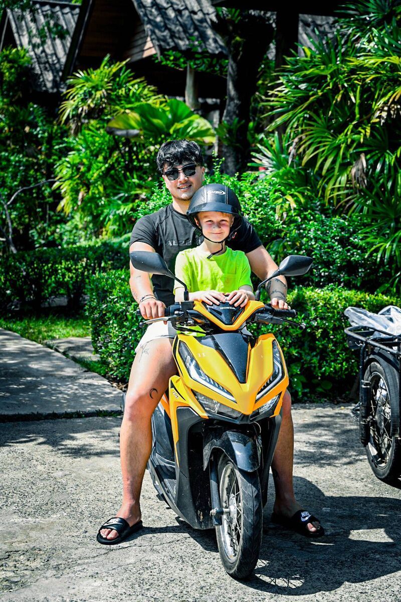 Kai and Cillian on a moped on the first day on Koh Yao Yai.