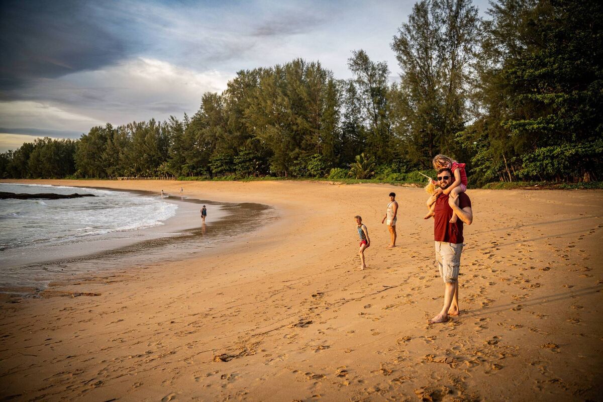 Davey, Kai, Cillian and Evie enjoy a walk along the long beaches of Khao Lak.