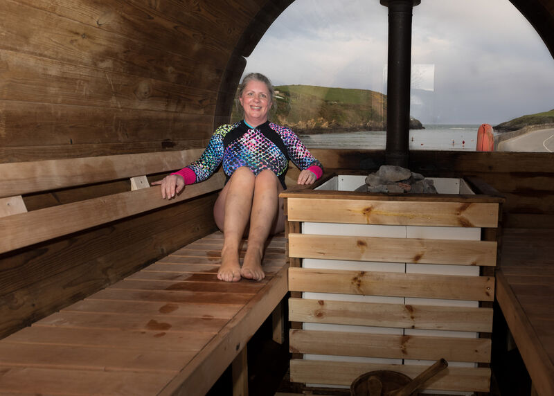 Deirdre McArdle using the Swede Sauna at Roberts Cove, Co. Cork.