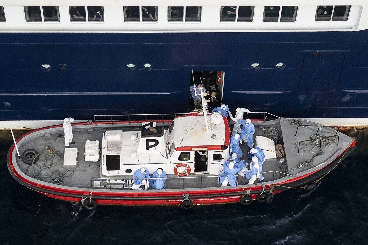 Health personnel assisting patients onto a boat from the cruise ship MV Hondius, while stationary off the port of Praia, the capital of Cape Verde, on May 6, 2026. (Photo by AFP via Getty Images)