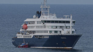 <p>The MV Hondius cruise ship is anchored at a port in Praia, Cape Verde, Wednesday, May 6, 2026. (AP Photo/Misper Apawu)</p>
