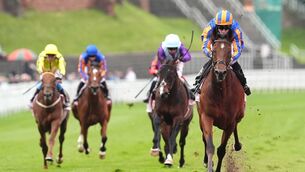 <p>IN FULL FLOW: Constitution River wins the Boodles Raindance Dee Stakes in the hands of Ryan Moore. 	Picture: Martin Rickett/PA </p>