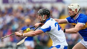<p>Waterford's Kevin Mahony in action against Tipperary's Robert Doyle. Pic: INPHO</p>