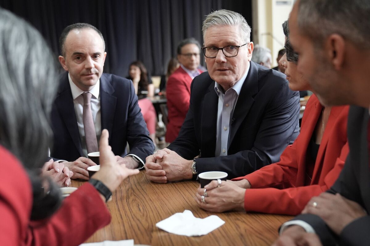 UK prime minister Keir Starmer and James Murray, chief secretary to the treasury (left), meet Labour Party members at Kingsdown Methodist Church Hall in Ealing, west London. Picture: Stefan Rousseau/PA Wire UK prime minister Keir Starmer and James Murray, chief secretary to the treasury (left), meet Labour Party members at Kingsdown Methodist Church Hall in Ealing, west London. Picture: Stefan Rousseau/PA Wire
