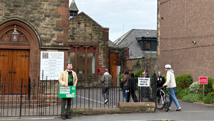 <p>Voters arrive to cast their votes in the 2026 Holyrood elections at St Helen's Church Hall in Shawlands, Glasgow, on Thursday.</p>
