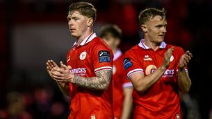 <p>Shelbourne players Kameron Ledwidge, left, and JJ Lunney after the  draw with Sligo. Pic: Seb Daly/Sportsfile</p>