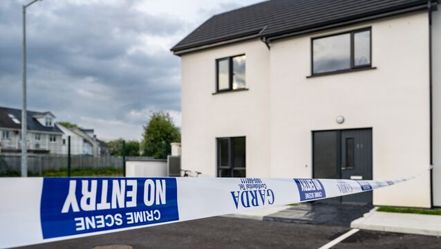 <p>The home in Carrick-on-Suir where the bodies of a woman and a newborn baby were found on Friday afternoon. Picture: Chani Anderson</p>