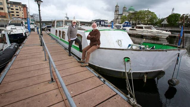 <p>Finian Coghlan (right)  and his neighbour Trevor Whitaker at Athlone Marina. Picture: Paul Molloy</p>
