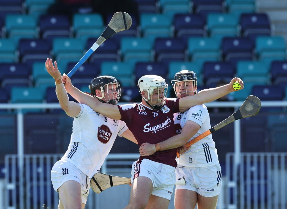 Galway’s Rory Burke tackled by Rian Boran and Cathal McCabe of Kildare. Pic: ©INPHO/Lorraine O’Sullivan