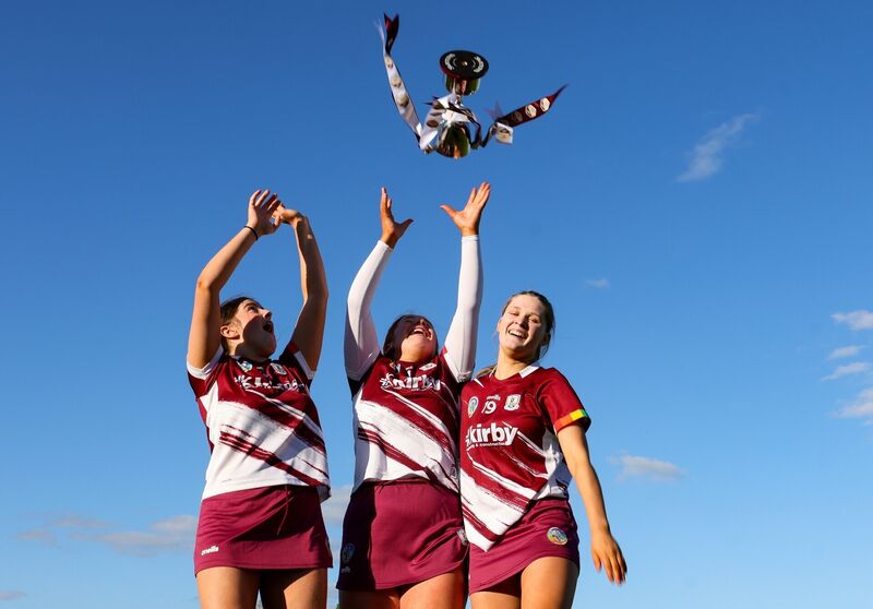Galway's joint captains Cara Giblin, Ciara Doyle and Ciara Mullins celebrate with the Kate Moran Cup. Pic ©INPHO/Grace Halton